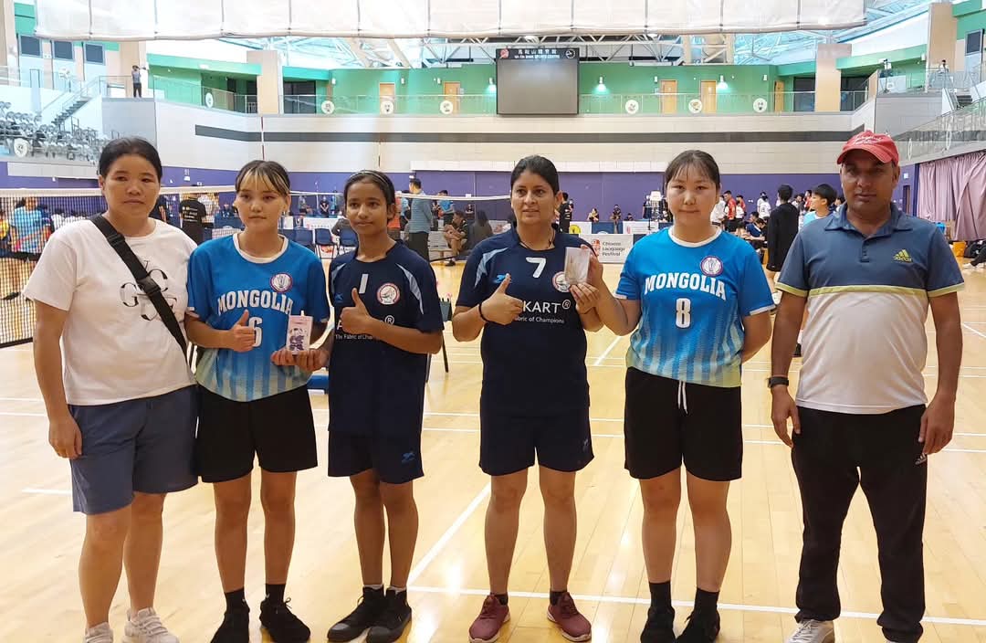 Shuttlecock players in action on court