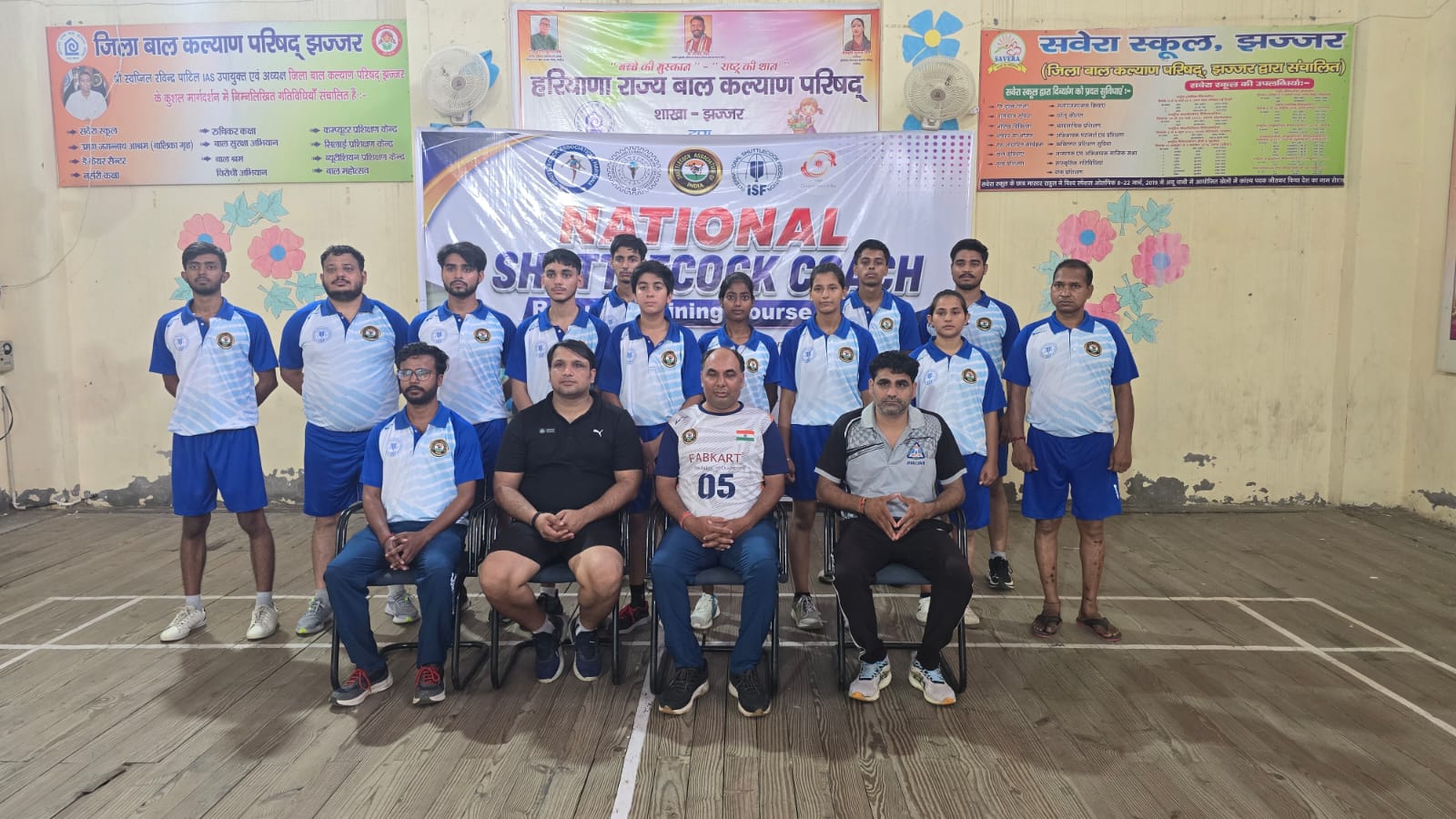 Coaches and officials at a Shuttlecock event